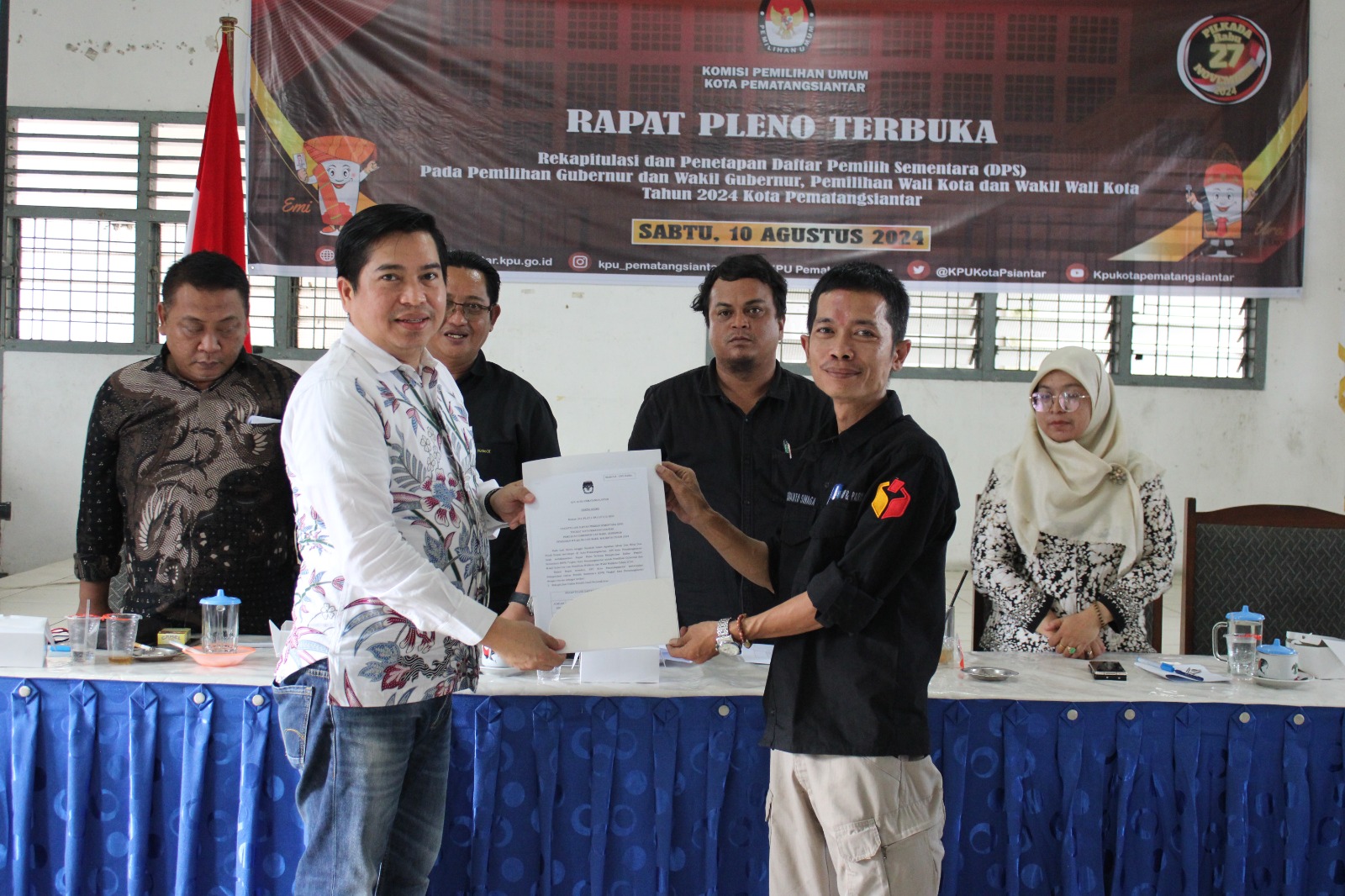 Bawaslu Kota Pematangsiantar Menerima Berita Acara Penetapan Daftar Pemilih Sementara (DPS) Kota Pematangsiantar, pada Pilkada 2024 di Kota Pematangsiantar menetapkan jumlah DPS sebanyak 202.619 pemilih digelar  di Gedung dharma wanita, Sabtu (10/8/2024).